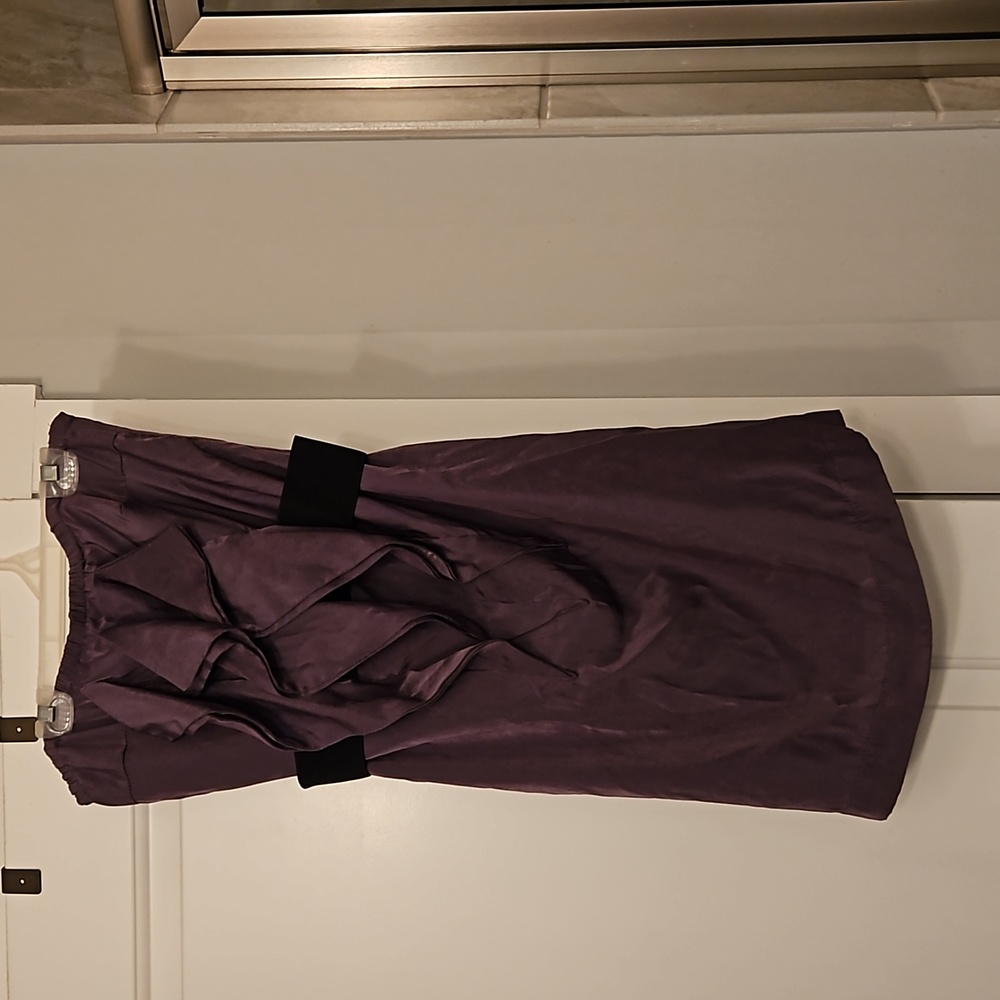 Purple strapless dress.
